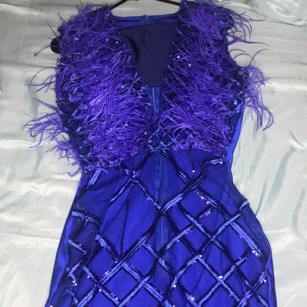 Custom made dress with feathers
